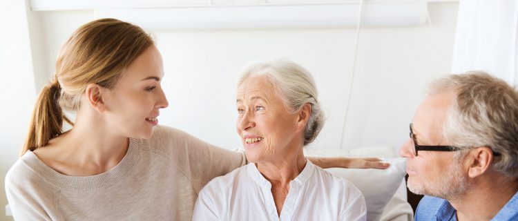 Family caring for senior woman