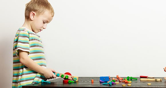 Boy Child Kid Preschooler Playing With Building Blocks Toys Inte